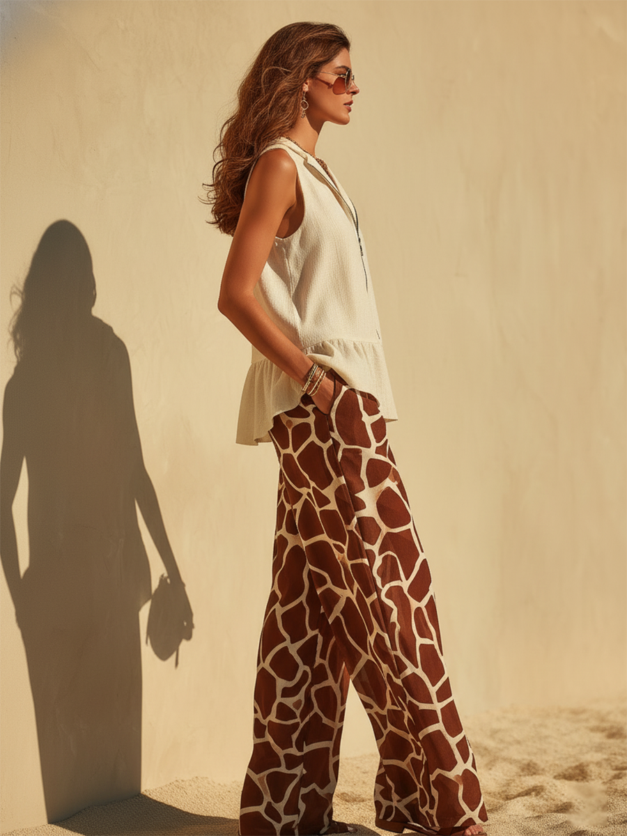 Vacation-Style Off-White Sleeveless Top And Printed Trousers Set